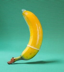 safe sex banana with condom on it