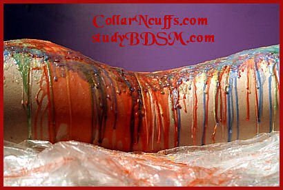 body with colored wax dripped over