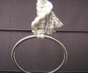 tying of a suspension ring