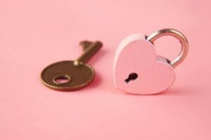 a pink padlock and key
