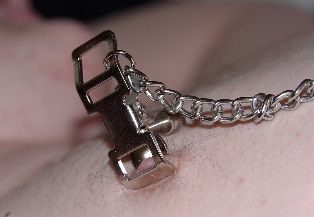 nipple clamps on male sub