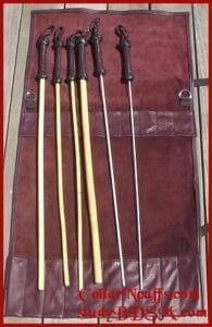 a selection of canes in a leather case